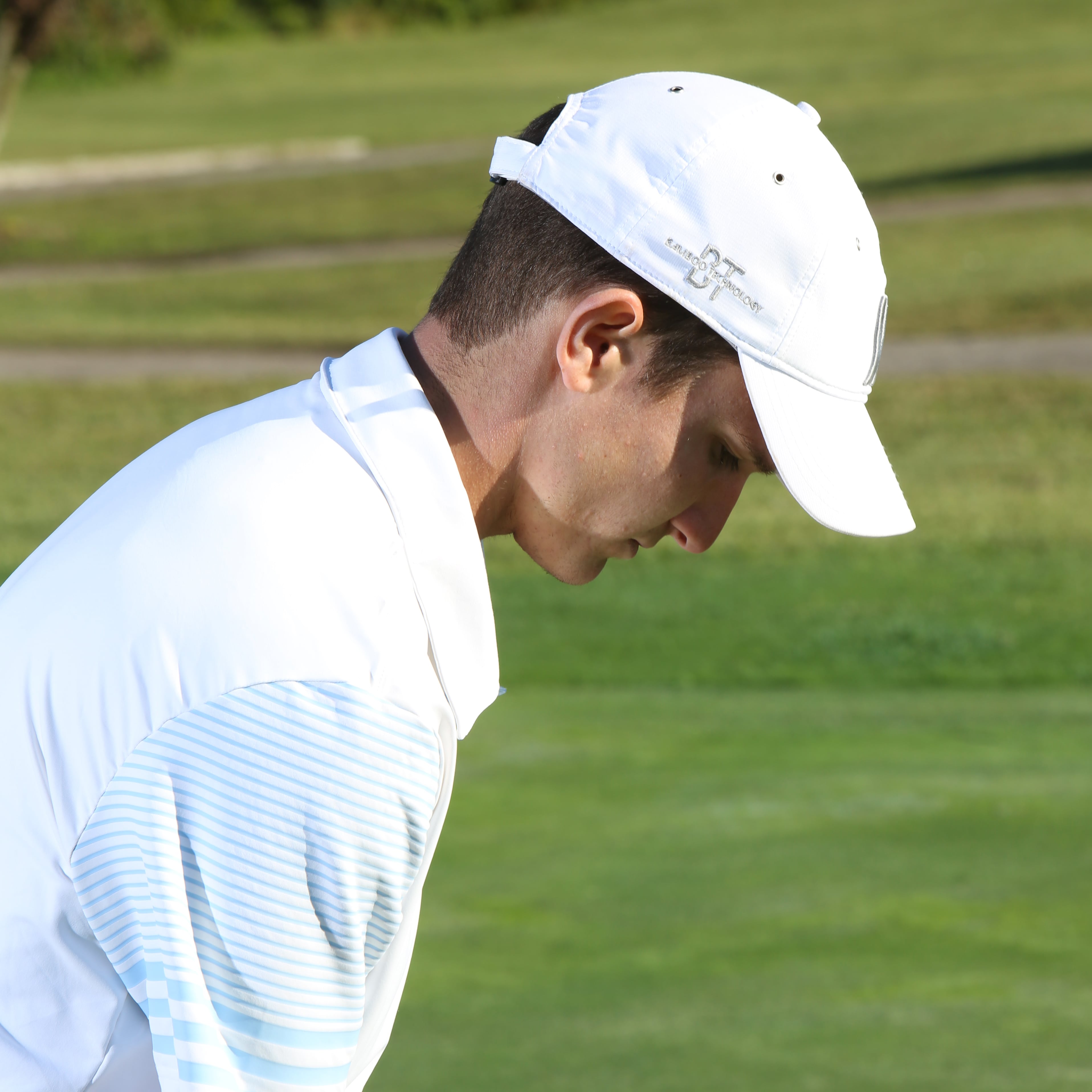 White Golf Hat_Size of Golfer.jpg__PID:232553bc-9282-4871-8bb8-40fd8f186fe1