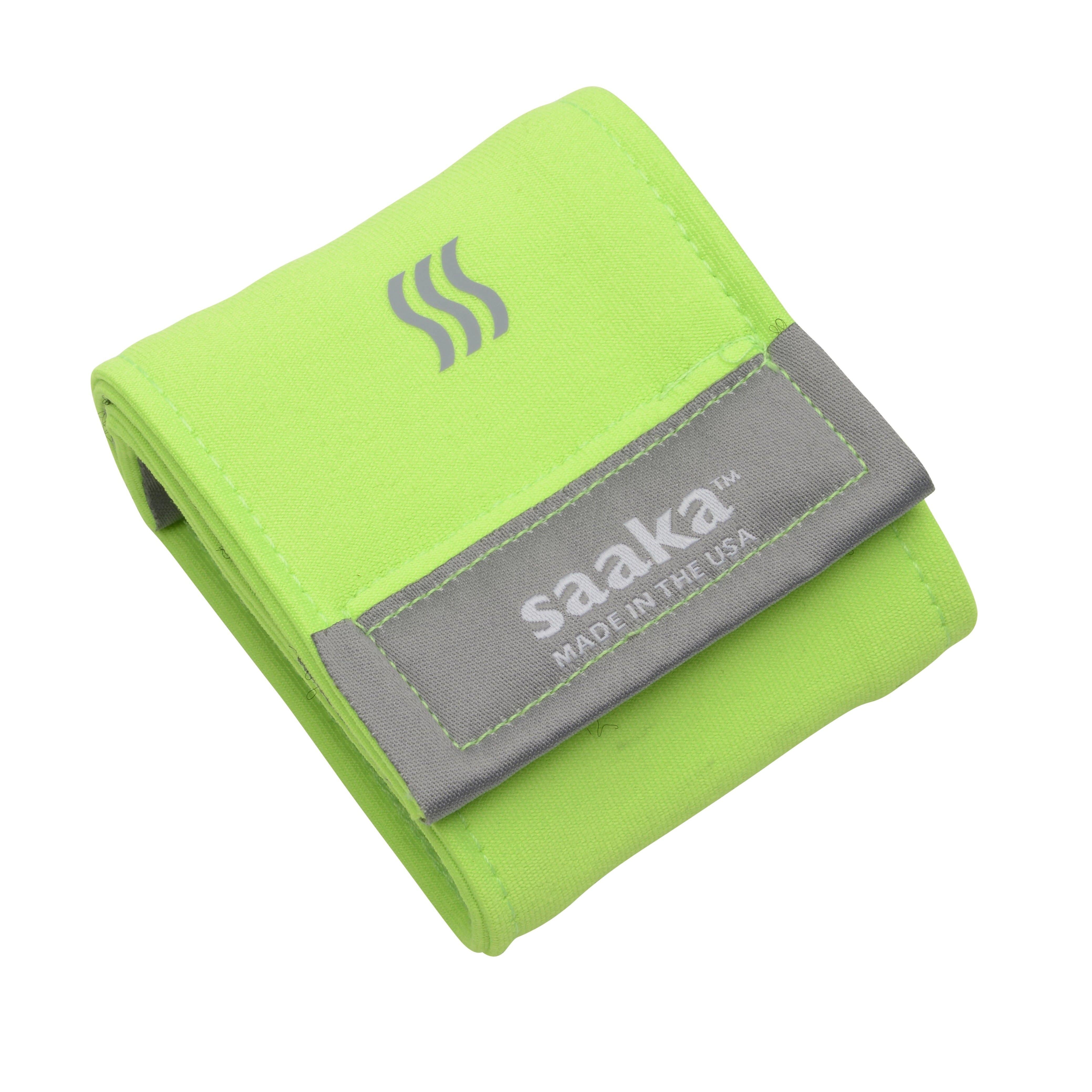 Product photo of a neon green athletic wristband that helps with sweat and moisture.