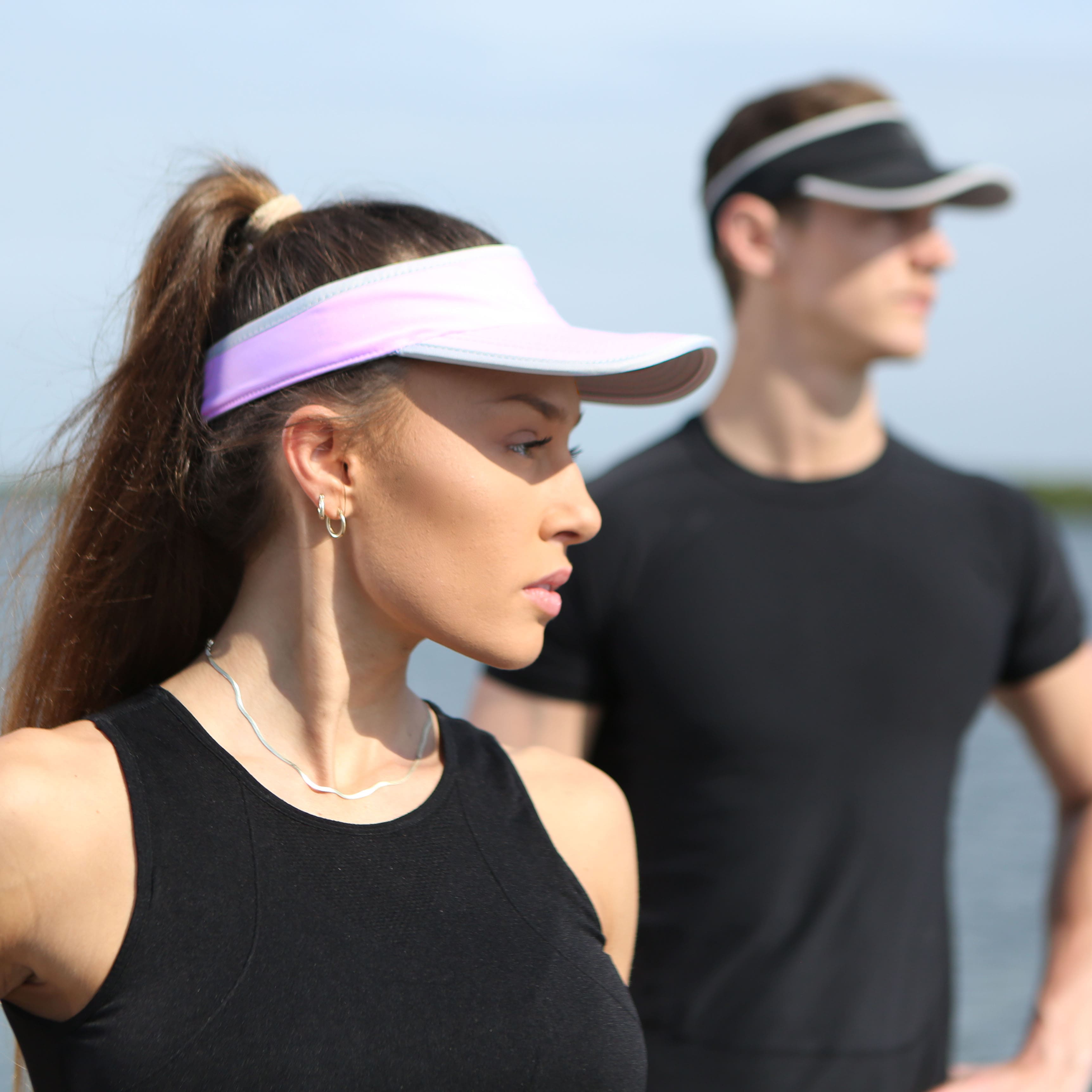 Men and women wearing a visor while running.