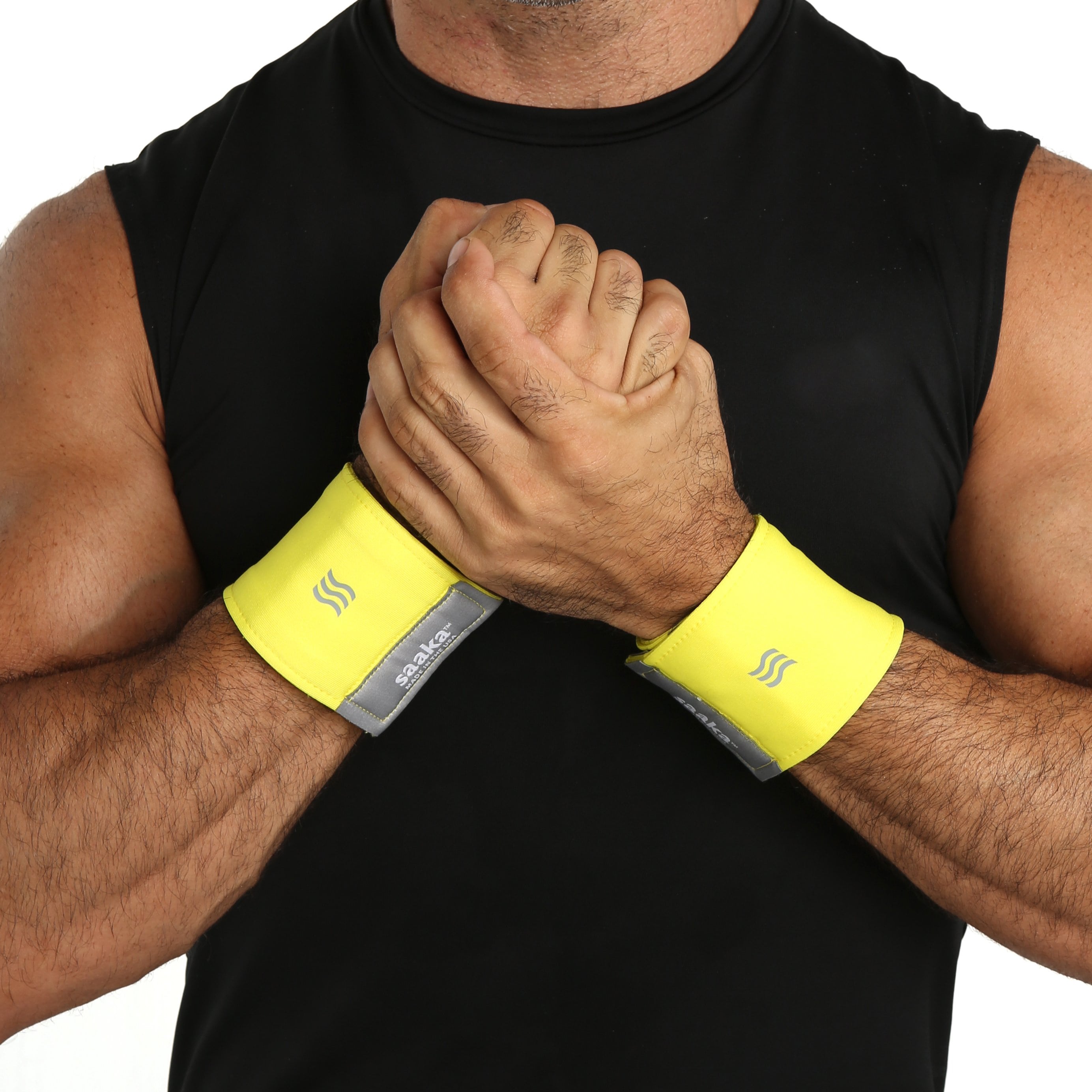 Athletic man wearing a pair of pickleball sweat wristbands.